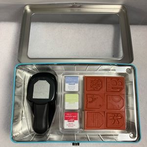 Tag punch with 3 little ink pads and stamps